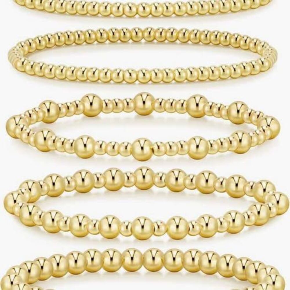 New gold colored beaded bracelets heavy/ nice quality